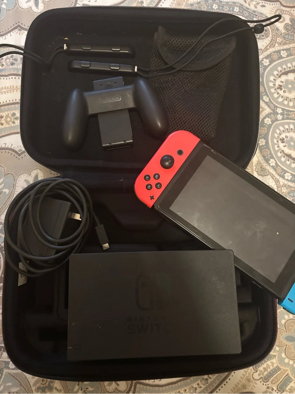 Nintendo Switch Console with Neon Red Left Joy‑Con and Blue Right Joy‑Con